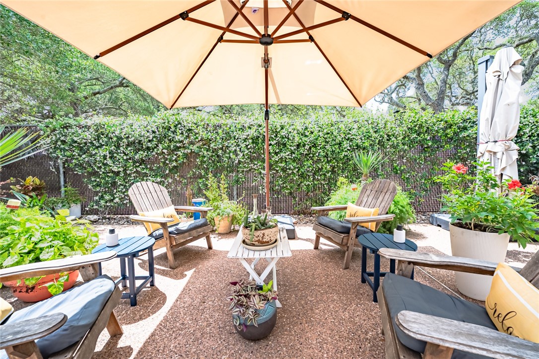 102 South 7th Street Fulton, TX 78358 - Photo 33 of 40 a view of backyard with outdoor seating and plants