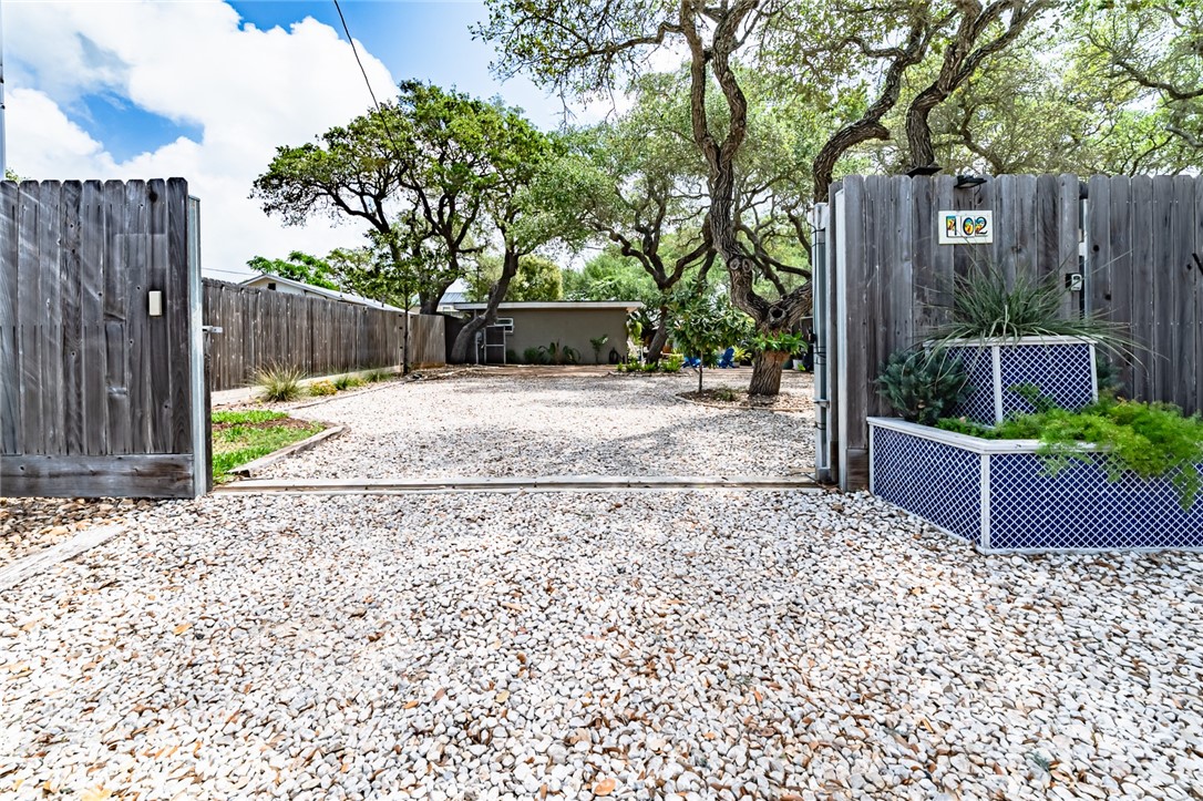 102 South 7th Street Fulton, TX 78358 - Photo 36 of 40 a house with a bench in front of it