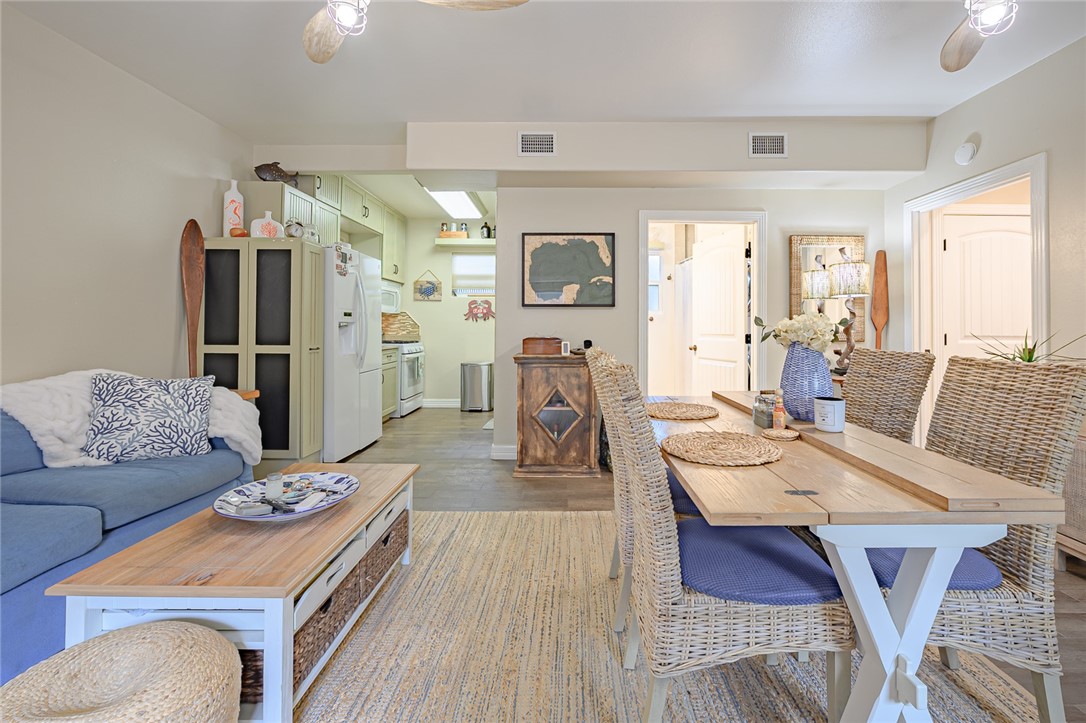 102 South 7th Street Fulton, TX 78358 - Photo 7 of 40 a living room with furniture and wooden floor