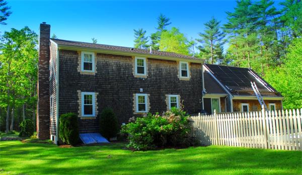 5 Old Farm Lane Rochester, MA 02770 - Photo 9 of 10 a front view of a house with a garden