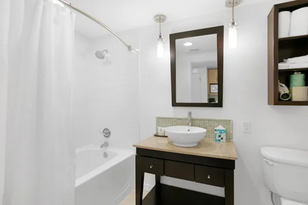 a bathroom with a sink and a bathtub