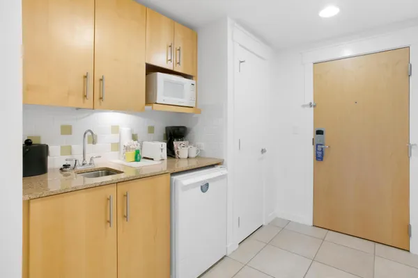 a bathroom with sink and mirror