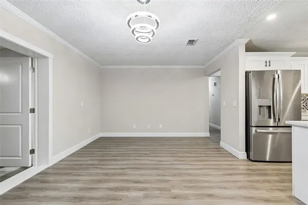 a bathroom with a shower and a sink