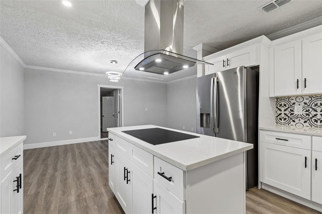 7403 Spring Court Tampa, FL 33634 - Photo 31 of 100 a kitchen with stainless steel appliances a refrigerator and a stove