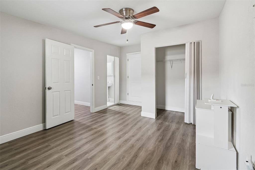 7403 Spring Court Tampa, FL 33634 - Photo 37 of 100 a view of empty room with wooden floor