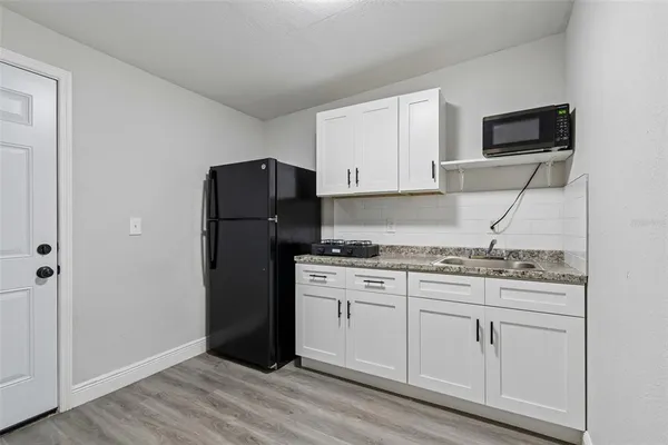 a bathroom with a shower curtain and a shower curtain