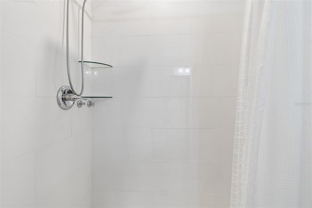 7403 Spring Court Tampa, FL 33634 - Photo 59 of 100 a view of a room with racks on the wall