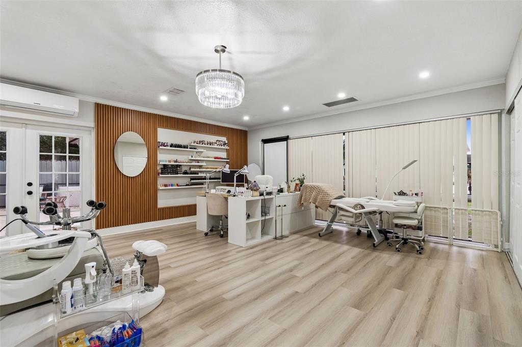 7403 Spring Court Tampa, FL 33634 - Photo 81 of 100 a living room with furniture kitchen view and a large window