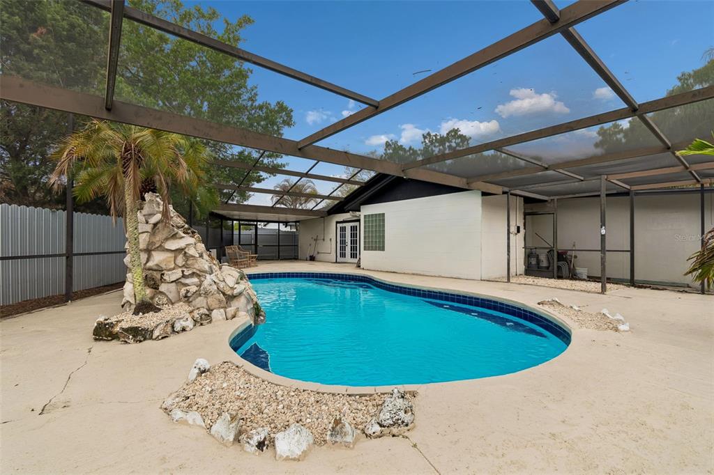 7403 Spring Court Tampa, FL 33634 - Photo 89 of 100 a view of a swimming pool with a patio