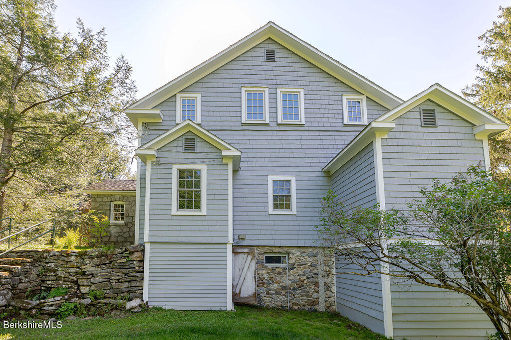 17 Cronk Road Monterey, MA 01245 - Photo 62 of 79 a view of a house with a yard and plants