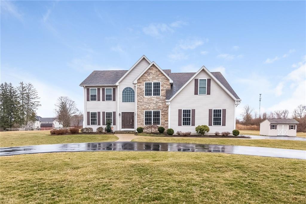 3 Jensen Farm Road Oxford, CT 06478 - Photo 1 of 1 a front view of a house with swimming pool and large trees