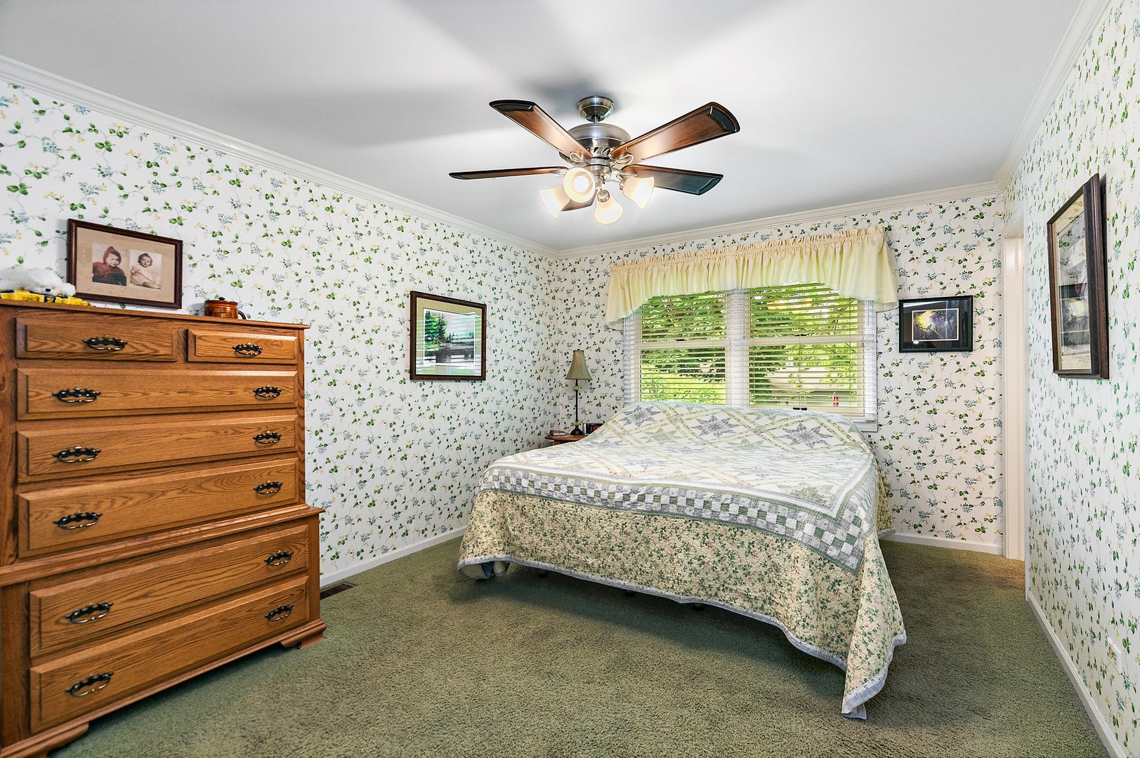 19 Green Ridge Road Elgin, IL 60120 - Photo 15 of 26 a bedroom with a bed and a flat screen tv