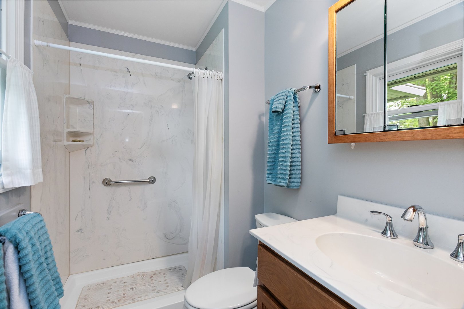 19 Green Ridge Road Elgin, IL 60120 - Photo 16 of 26 a bathroom with a sink toilet and shower