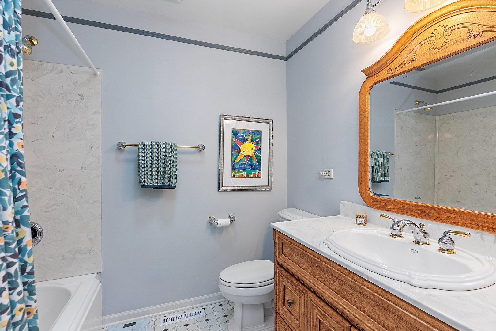 19 Green Ridge Road Elgin, IL 60120 - Photo 18 of 26 a bathroom with a toilet sink and mirror