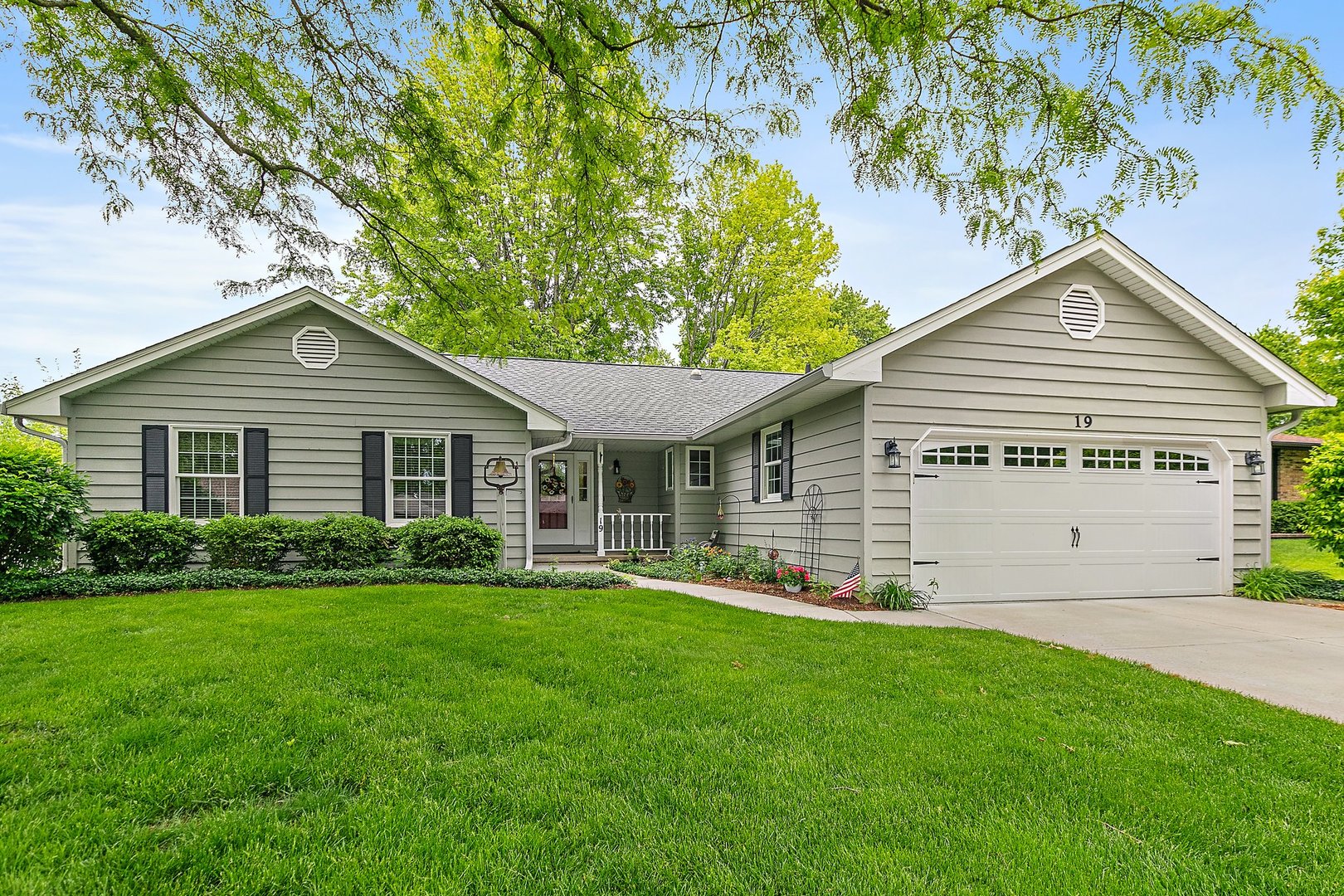 19 Green Ridge Road Elgin, IL 60120 - Photo 2 of 26 a view of a house with a yard and garden