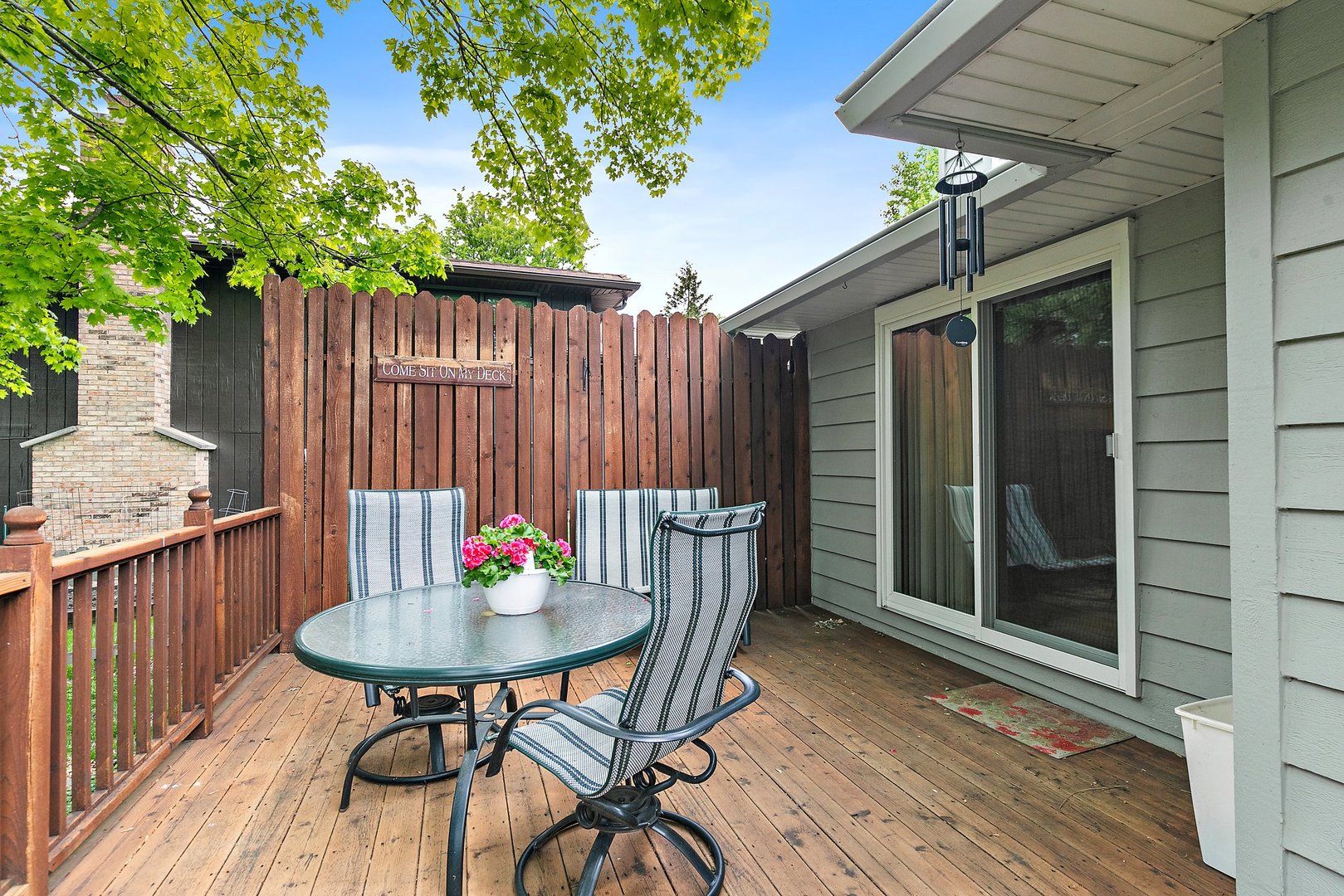 19 Green Ridge Road Elgin, IL 60120 - Photo 22 of 26 a table and chairs in patio of the house