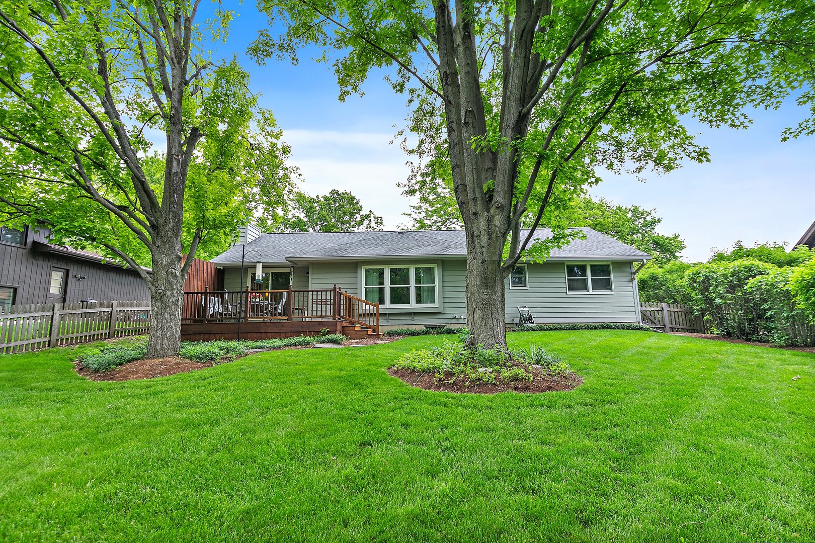 19 Green Ridge Road Elgin, IL 60120 - Photo 24 of 26 a front view of a house with a garden