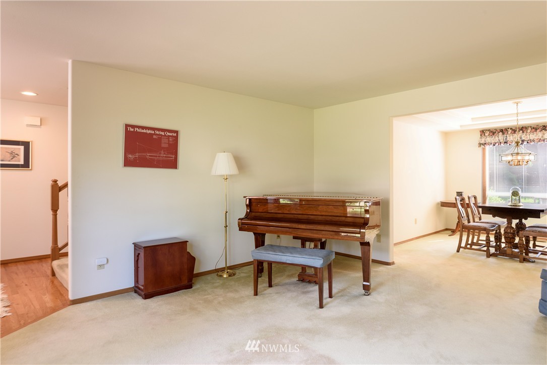 1610 Field Avenue Northeast Renton, WA 98059 - Photo 2 of 14 a reading room with furniture and a piano