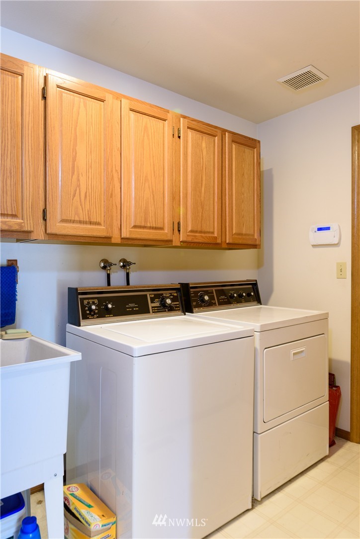 1610 Field Avenue Northeast Renton, WA 98059 - Photo 12 of 14 a room with storage and utility