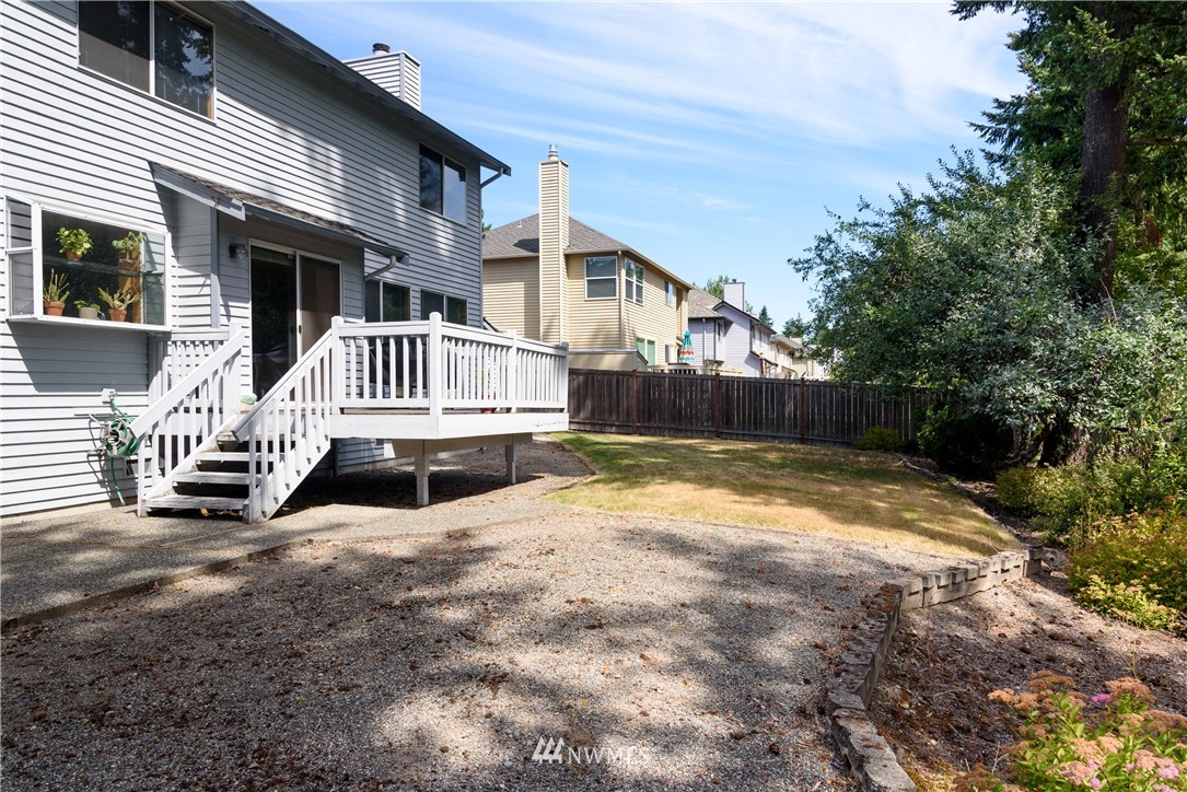 1610 Field Avenue Northeast Renton, WA 98059 - Photo 13 of 14 a view of a house with wooden fence in front of house