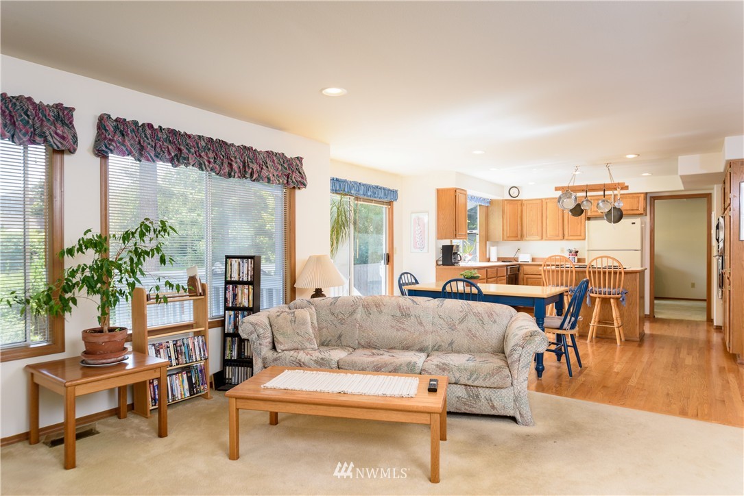 1610 Field Avenue Northeast Renton, WA 98059 - Photo 7 of 14 a living room with furniture and a large window