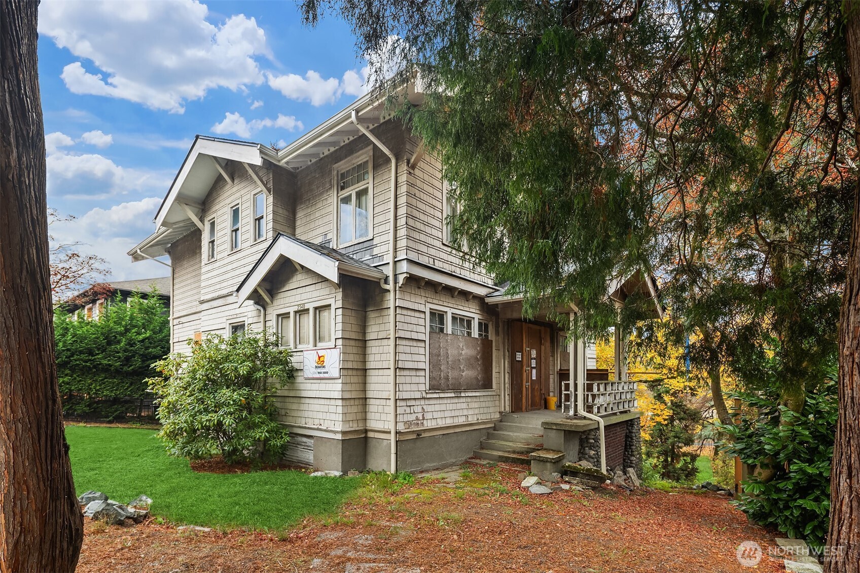 2540 34th Avenue South Seattle, WA 98144 - Photo 2 of 20 a front view of a house with a yard