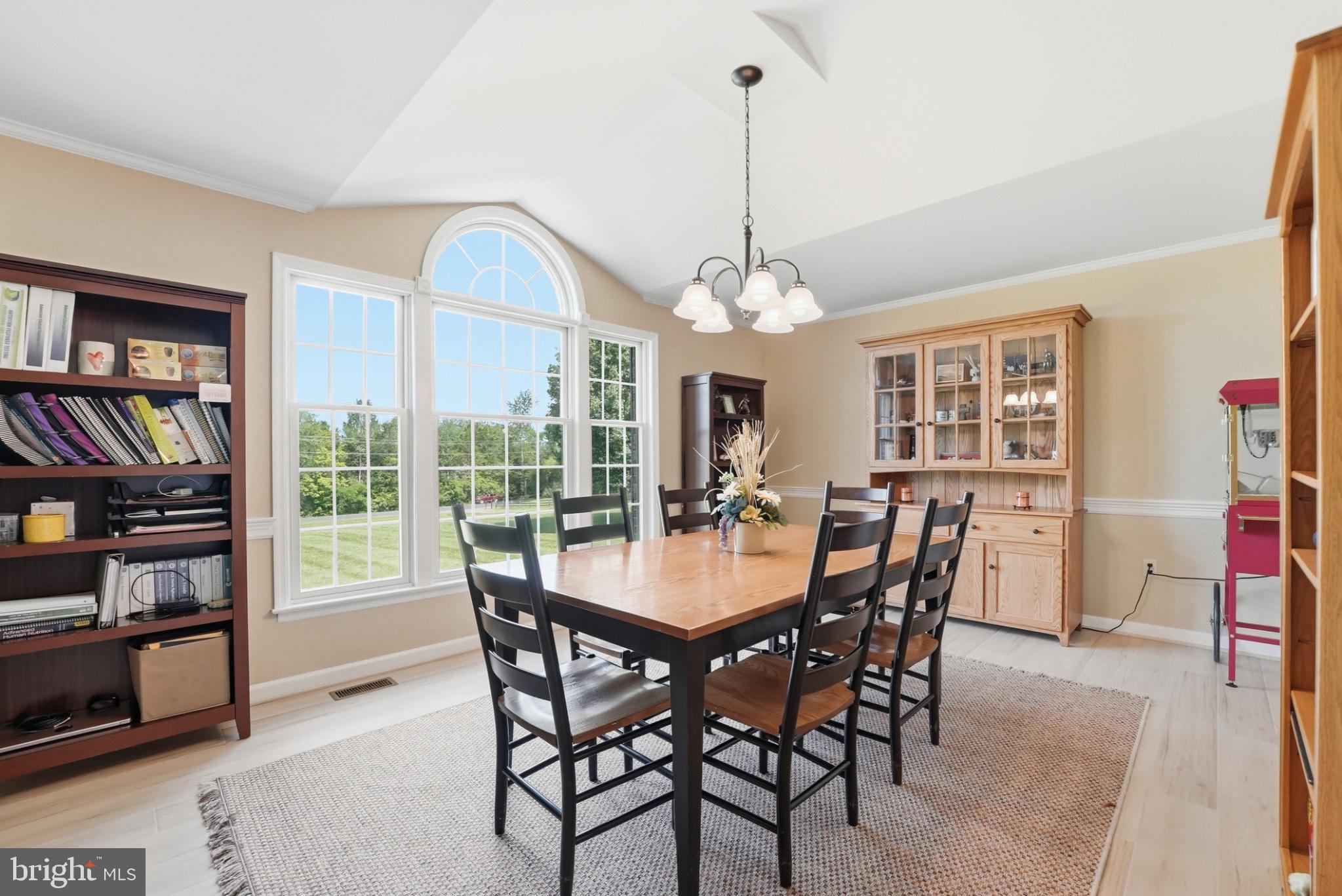 11337 Old Stillhouse Road Boston, VA 22713 - Photo 29 of 58 a view of a dining room with furniture window and wooden floor