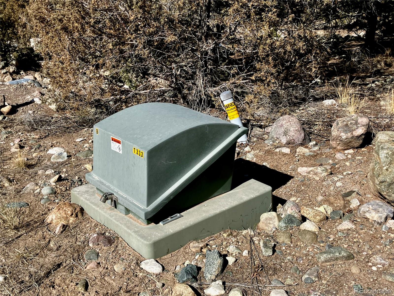2187 Spanish Creek Road Crestone, CO 81131 - Photo 10 of 10 a view of a yard in the back of a building