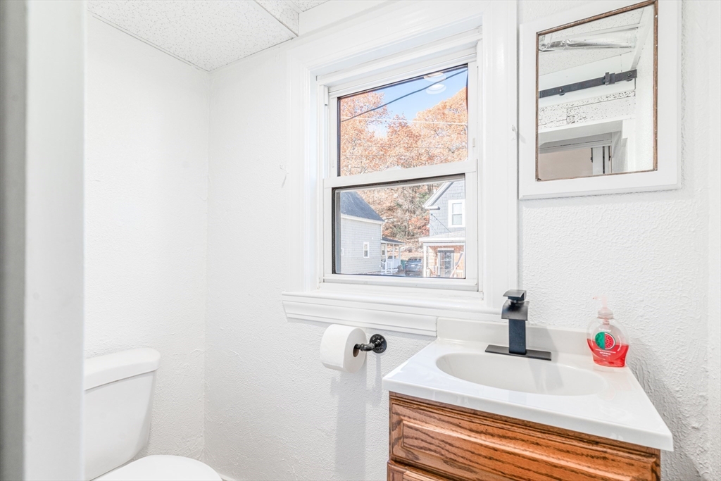 5 Sherbrook Place Lynn, MA 01904 - Photo 5 of 34 a bathroom with a sink and a toilet