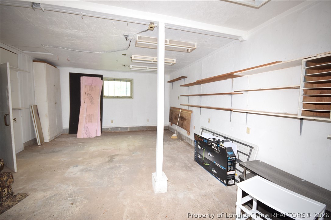 108 South 6th Street Spring Lake, NC 28390 - Photo 18 of 20 a view of a hallway with staircase
