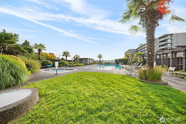 a view of a lake with a car parked