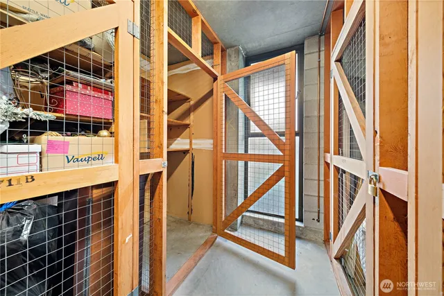 a view of a bathroom with a shower and a sink