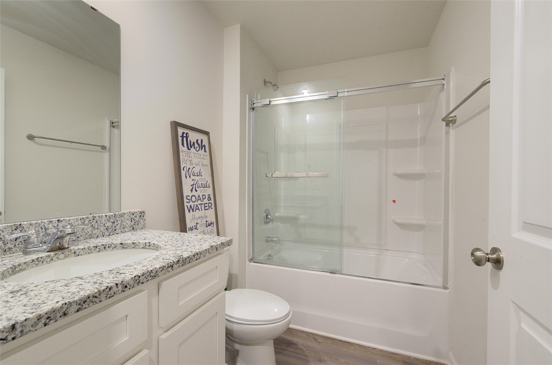 408 Chadwick Lane Walhalla, SC 29691 - Photo 23 of 44 A well-appointed bathroom with a spacious shower and elegant granite countertops.