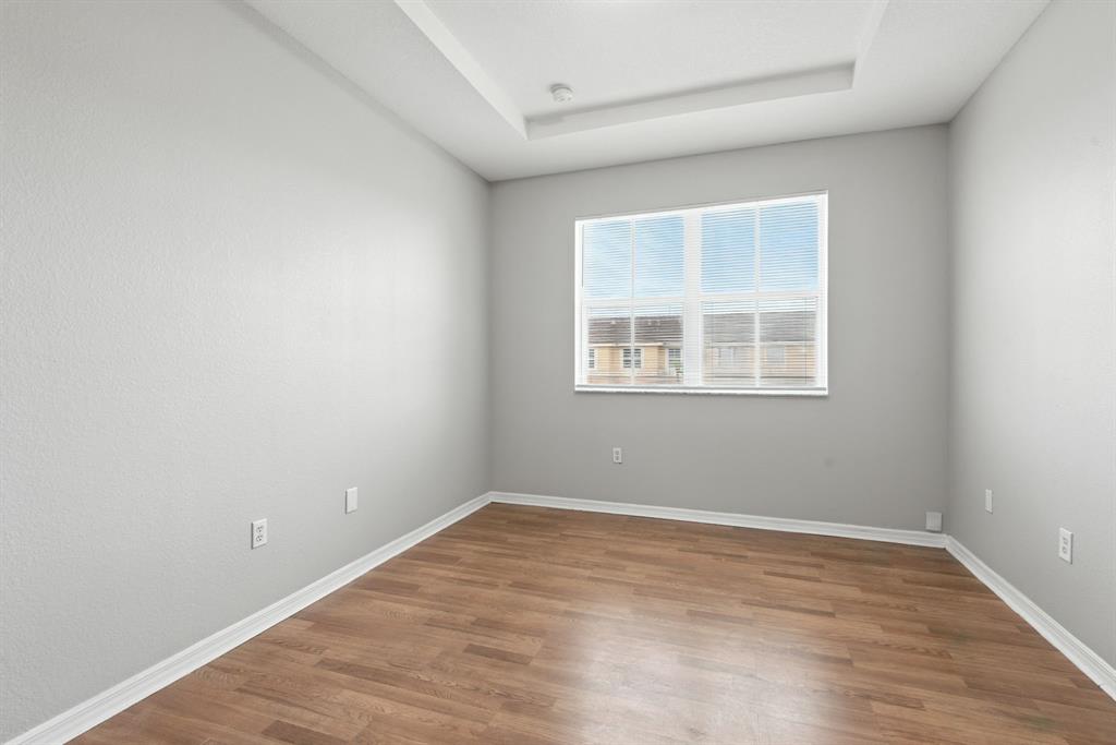 24055 Southwest 109th Court Homestead, FL 33032 - Photo 21 of 42 an empty room with a window