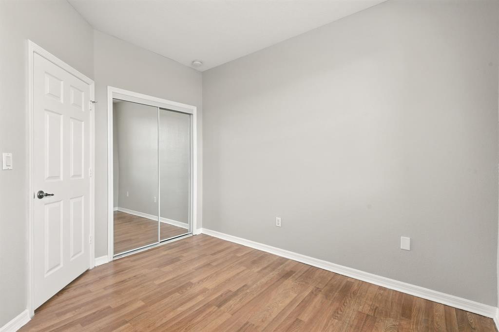 24055 Southwest 109th Court Homestead, FL 33032 - Photo 25 of 42 a view of an empty room with wooden floor