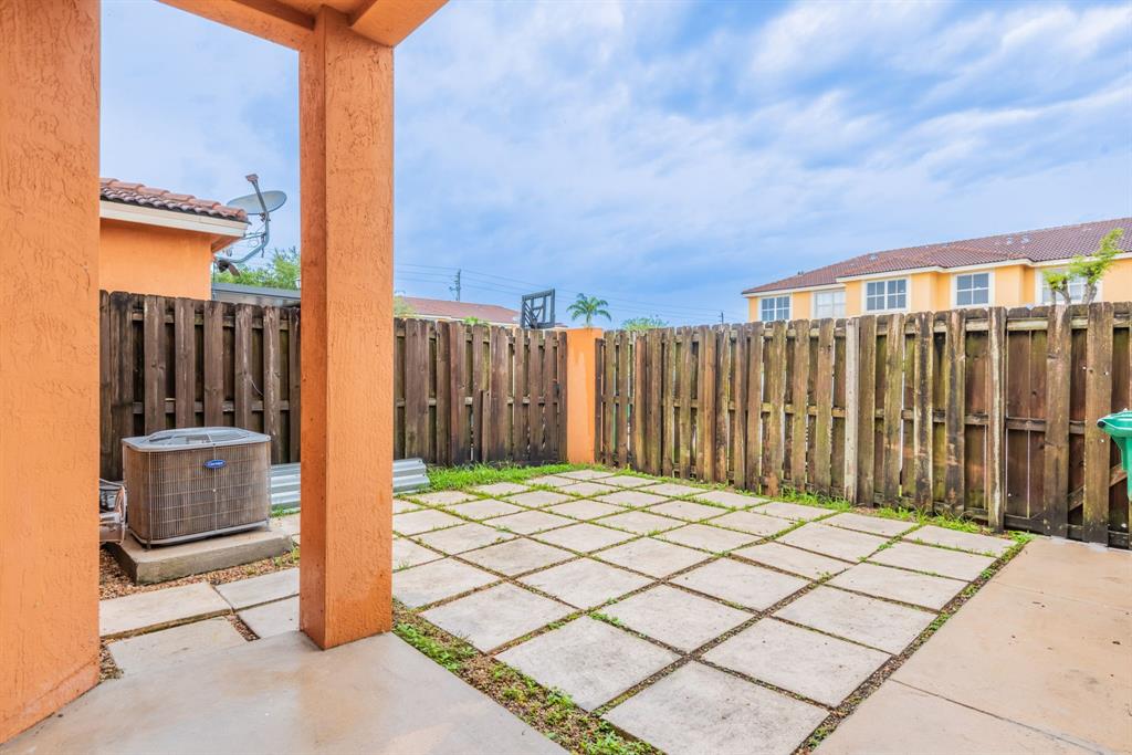 24055 Southwest 109th Court Homestead, FL 33032 - Photo 35 of 42 a backyard of a house