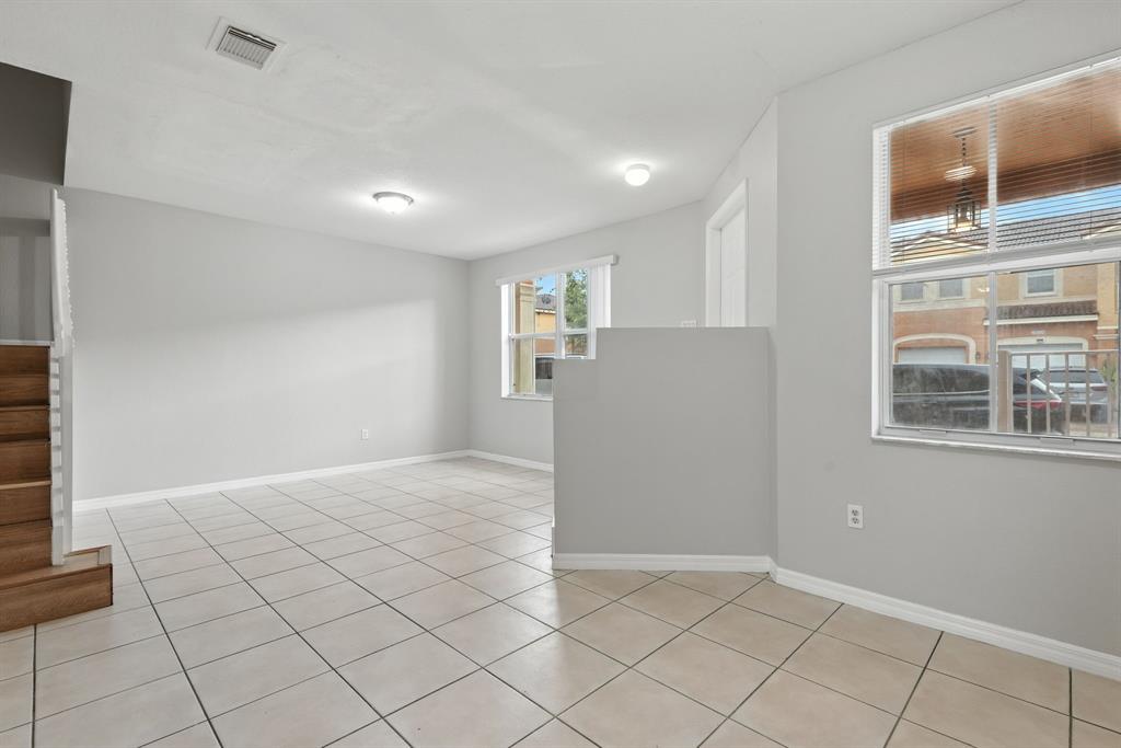 24055 Southwest 109th Court Homestead, FL 33032 - Photo 8 of 42 a view of an empty room with a window