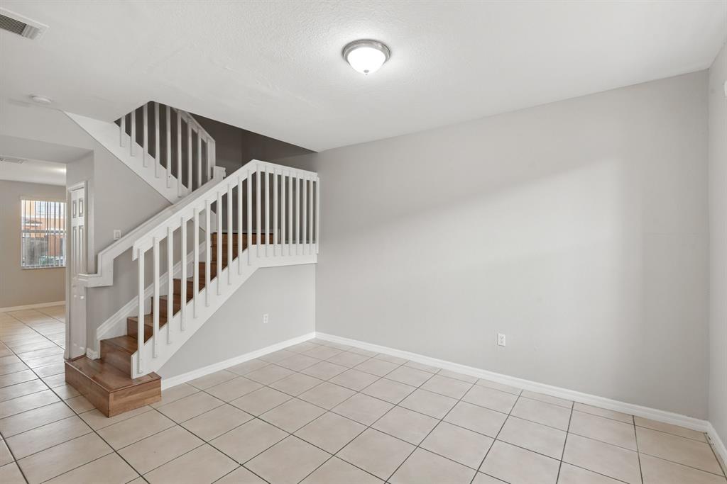 24055 Southwest 109th Court Homestead, FL 33032 - Photo 9 of 42 a view of an entryway with wooden floor