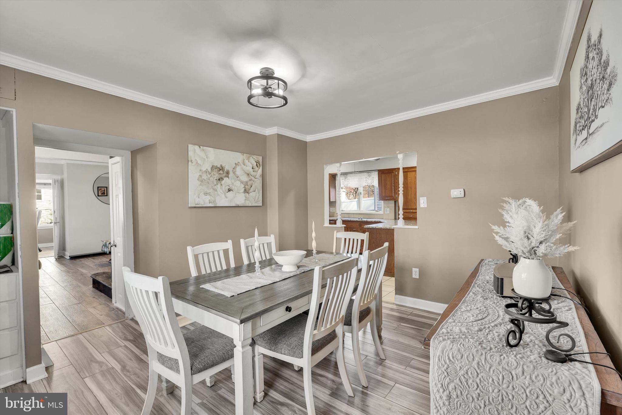 13497 Trevose Road Philadelphia, PA 19116 - Photo 17 of 34 a view of a dining room with furniture and wooden floor