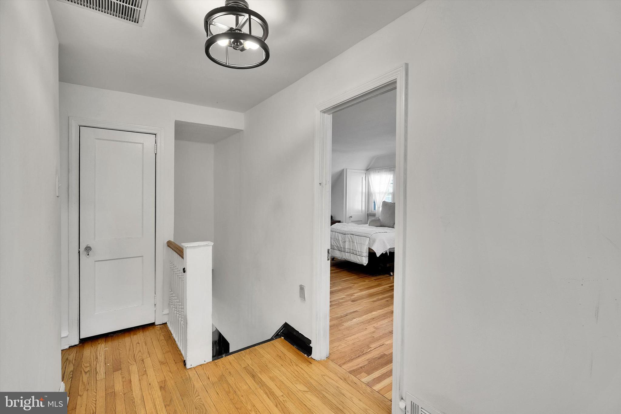 13497 Trevose Road Philadelphia, PA 19116 - Photo 21 of 34 a view of a room with wooden floor and bathroom