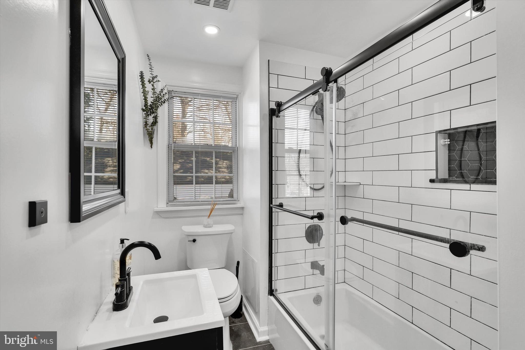 13497 Trevose Road Philadelphia, PA 19116 - Photo 22 of 34 a bathroom with a sink and mirror