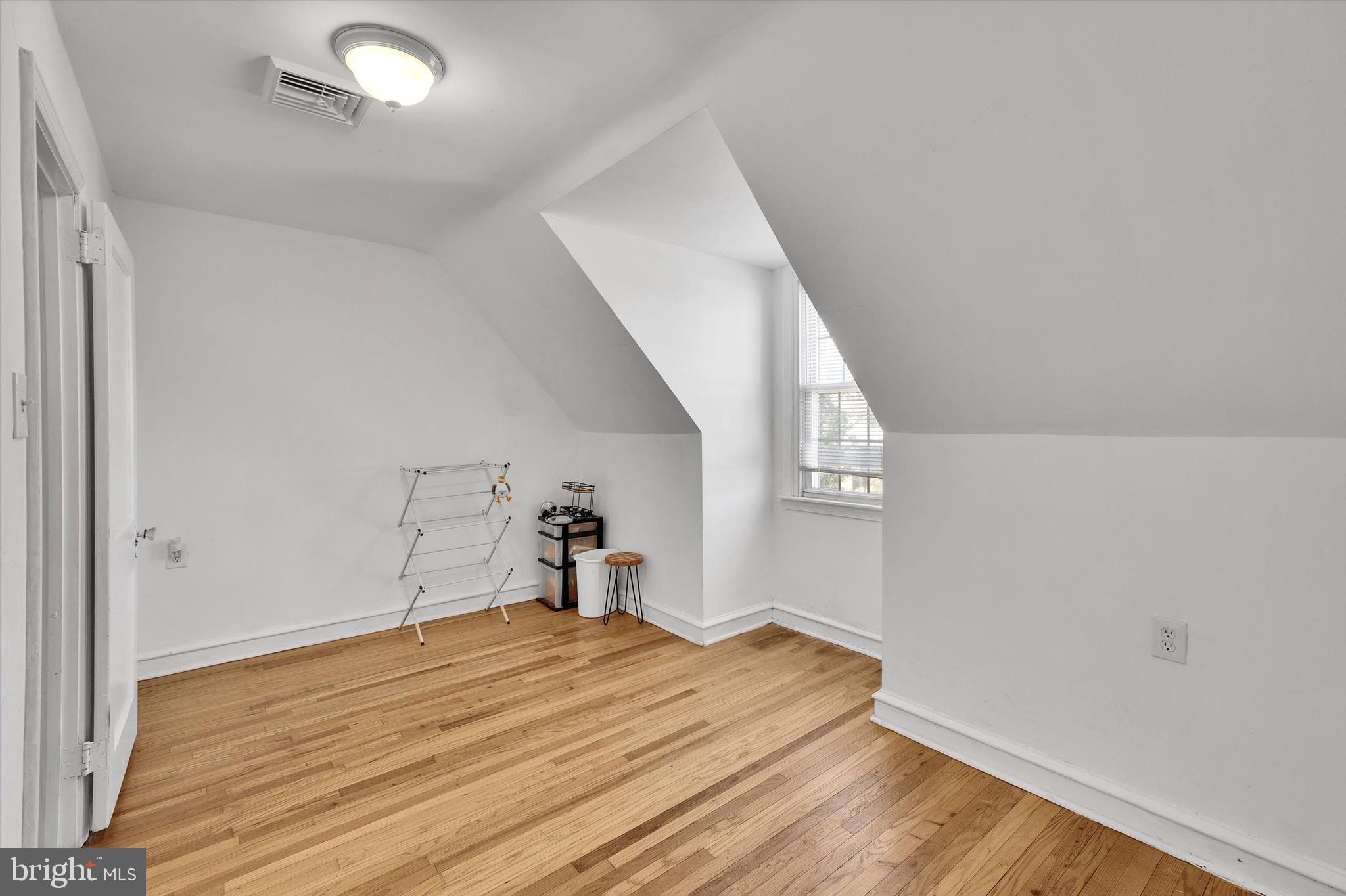13497 Trevose Road Philadelphia, PA 19116 - Photo 24 of 34 a view of a room with wooden floor and white walls