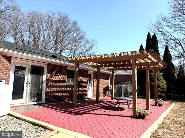 a view of a chairs and tables in patio