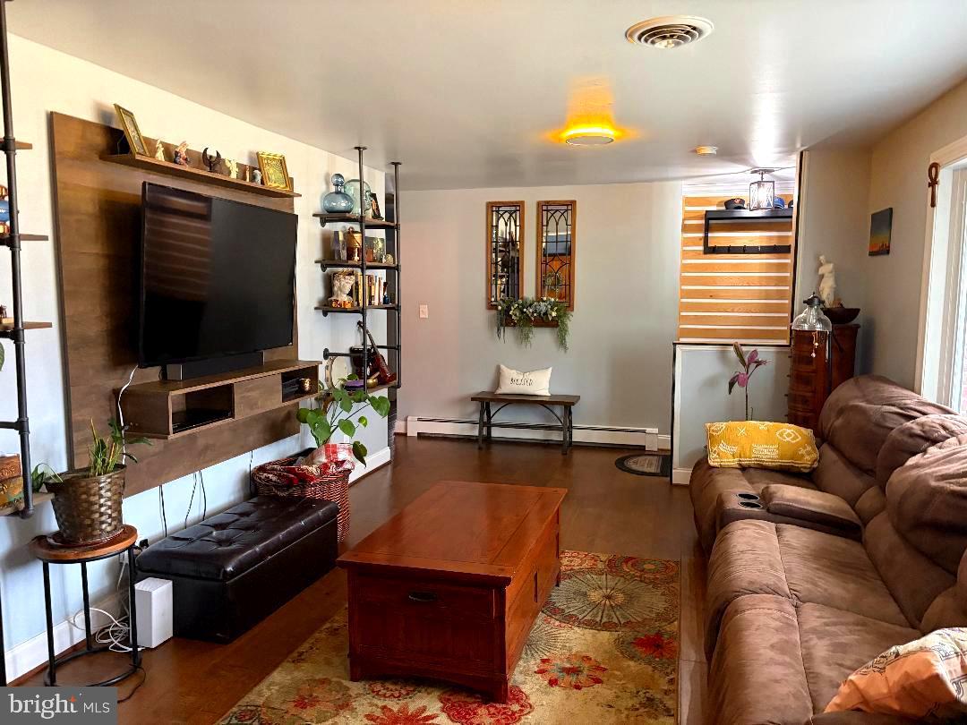 2615 Whitt Road Kingsville, MD 21087 - Photo 25 of 45 a living room with furniture and a flat screen tv