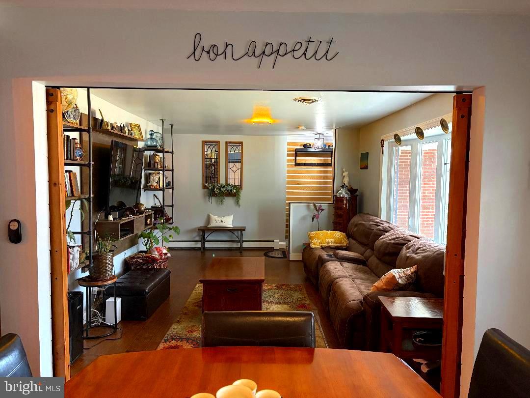 2615 Whitt Road Kingsville, MD 21087 - Photo 3 of 45 a living room with furniture and a flat screen tv