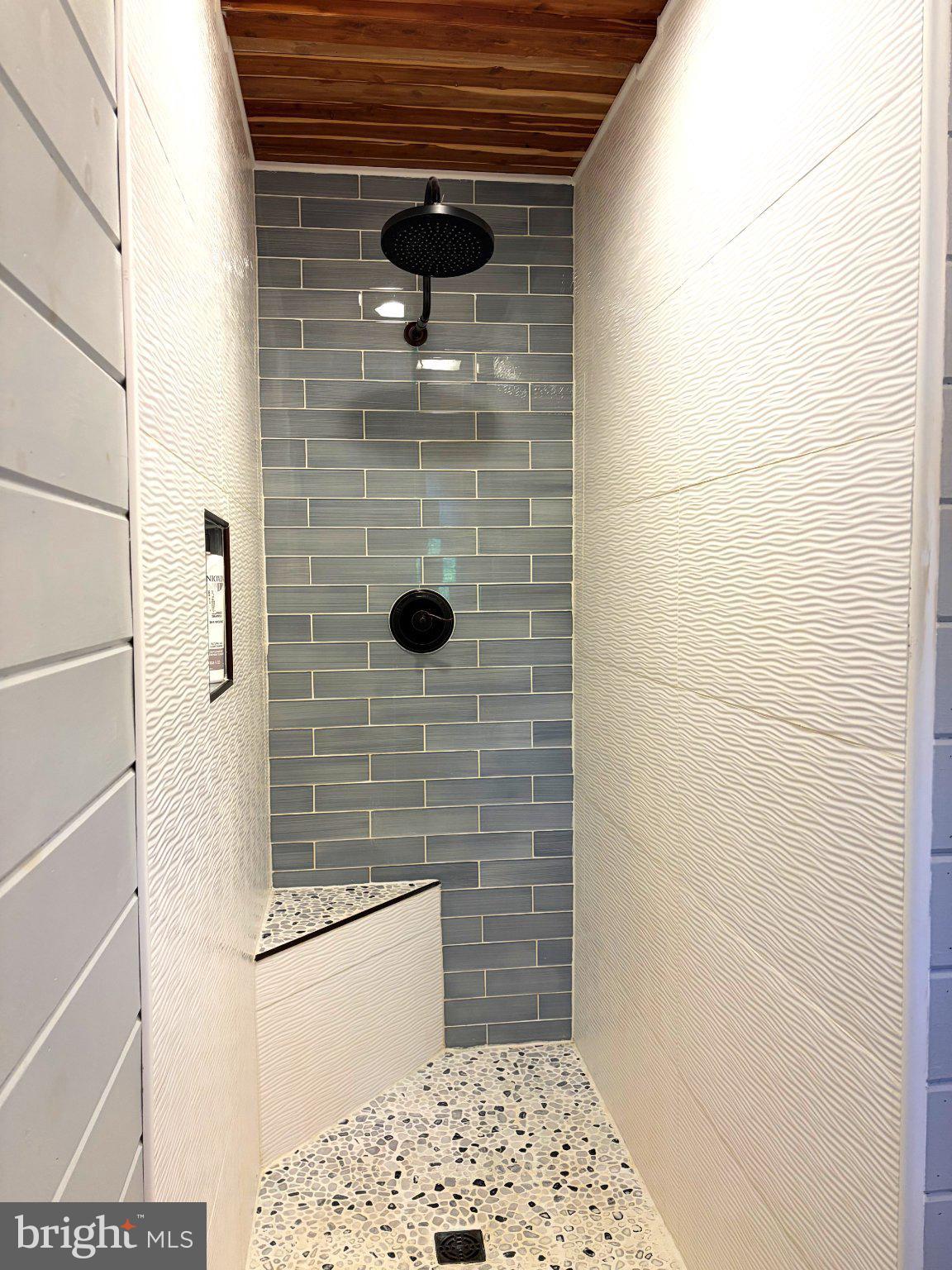 2615 Whitt Road Kingsville, MD 21087 - Photo 58 of 71 Sleek modern shower with textured tiles.