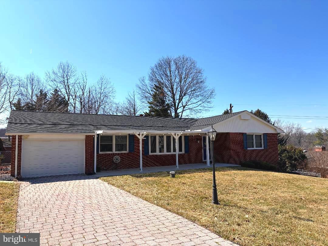 2615 Whitt Road Kingsville, MD 21087 - Photo 7 of 45 a front view of a house with a yard and garage