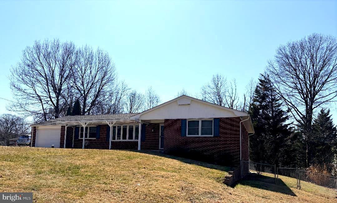 2615 Whitt Road Kingsville, MD 21087 - Photo 8 of 45 a front view of a house with a yard