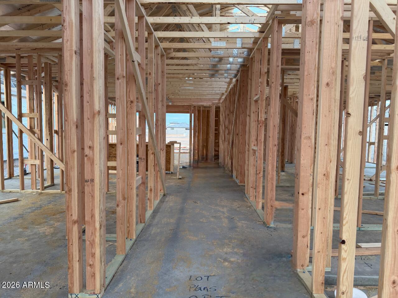 5606 West Piedmont Road Laveen, AZ 85339 - Photo 3 of 19 a view of a hallway with wooden floor and entryway