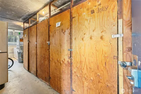 a view of a bathroom with shower and a bathroom